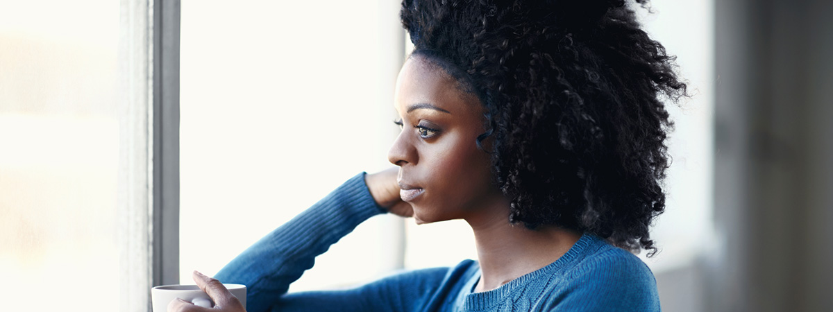 Woman reflecting on what her life would be like without depression in Duluth